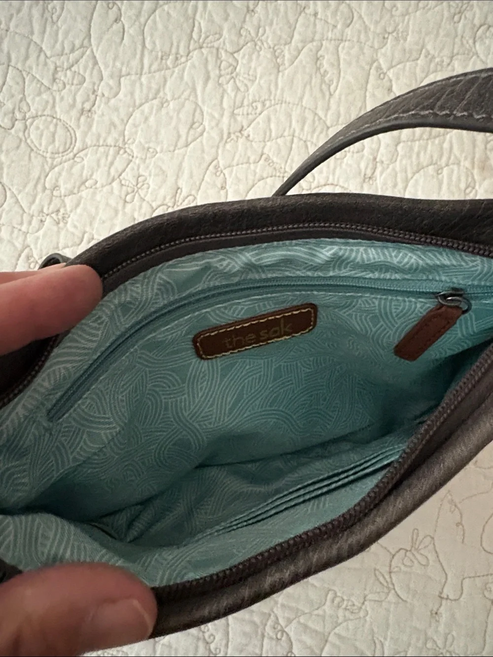 The Sak Leather Messenger Bag in Black and Cream Woven Front